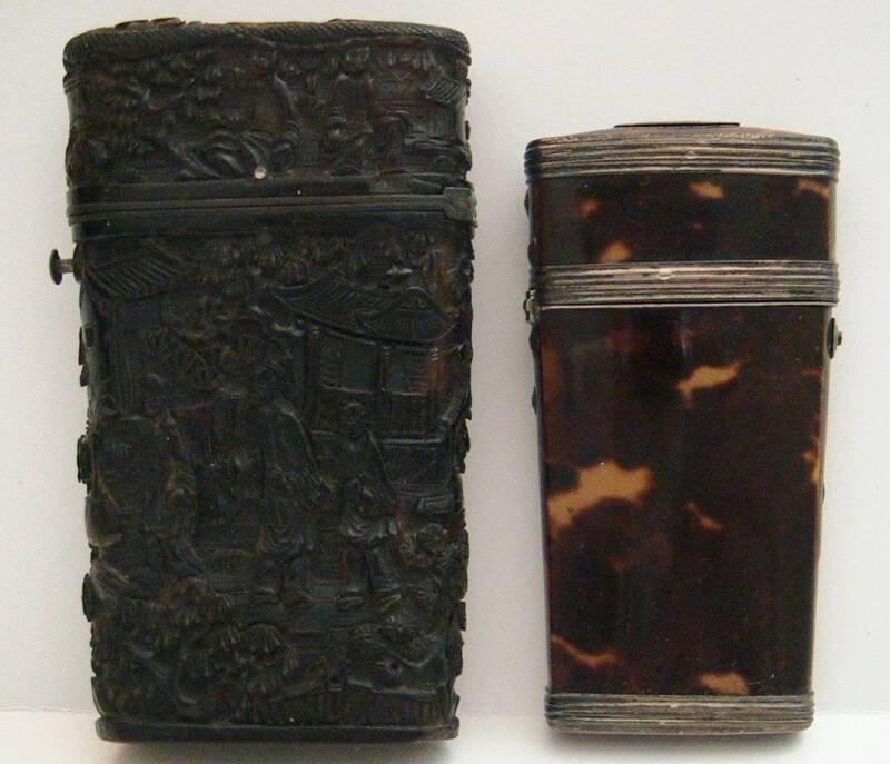 Pictured are three tortoise shell lancet cases.  The piece on the R is banded in silver with a silver cartouche on the top.The lancet case on the L is a very rare form, thought to have been made for export from China c.1810-1820.  The case holds 6 matched unmarked thumb lancets.  The panels of the case are covered with a scene of workers in the field adjacent to a series of huts.  The top of the case is bordered by a serpent of some form.  