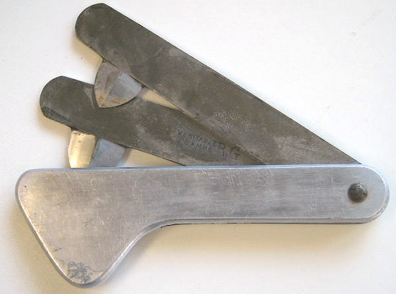 Aluminum 2 bladed fleam, marked Veritable Flamme B.G.  French in origin c. 1890.