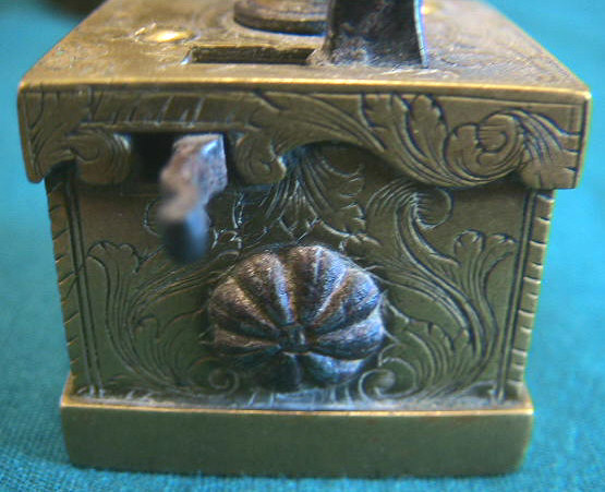 Extremely rare version of a common Viennese (Wien) brass scarificator.  This item is identical in form to the pieces seen elsewhere on the site.  The pieces all have a typical square brass construction with the heart or crown shaped depth screw and 5-6-5 blade configuration.  This piece is unique in its ornate engraving and inscription of "Joh Jacob Fischer in Wien" and the addition of a 1755 date mark.