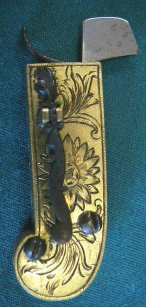 Rare highly engraved spring lancet.  Austrian in origin dated 1790.  Inscribed A. Fischer for Andreas Fischer.  The spring mechanism is a swan's head design very typical of the craftsmen of Vienna. The lancet is contained in a fitted red leather case with gold triim and floral embossing.