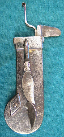Iron-cased spring lancet.  German in origin c. 1725-1750.  Note the unusual bar release mechanism.  The case is inscribed  JPH. 