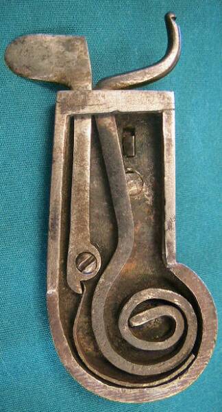 Iron-cased spring lancet.  German in origin c. 1810-1840.    Note the unusual blade stay mechanism. 