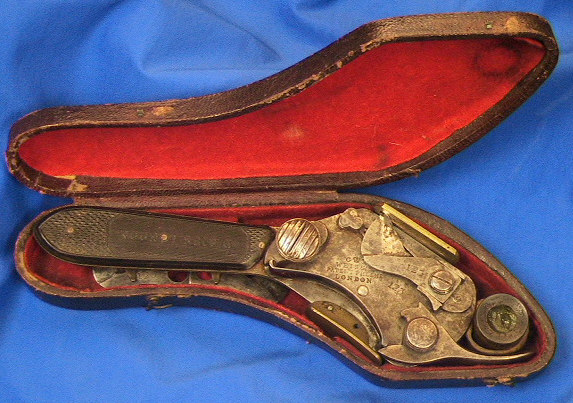 Mint condition Weiss's model spring lancet for veterinary use.  The item is in the original velvet lined case with 2 extra blades and a grease pot to lubricate the mechanism.  While these items are hard to find this one is exceptional in the completeness of the kit.