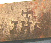 A 4 bladed brass fleam.  This piece has the typical scale style of a piece made c.1700-1750.  The scale is marked IOHN CAM, the blades are marked IHS with a cross.  This marking has heavy religious overtones as the IHS and cross mark is one emblem used by the Jesuit order, formed from the Latin spelling for Jesus, IHESUS.  Research continues into John Cam. 